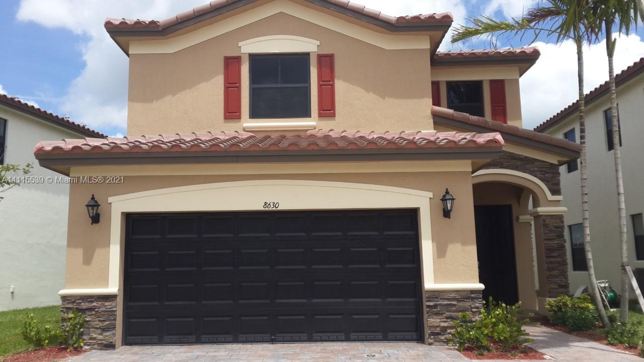 8630 West 33rd Avenue Hialeah, FL 33018 - Photo 14 of 22 a front view of a house