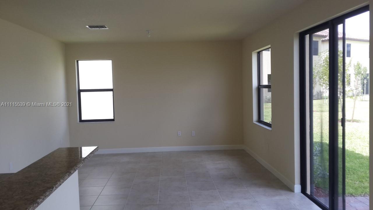 8630 West 33rd Avenue Hialeah, FL 33018 - Photo 3 of 22 an empty room with windows