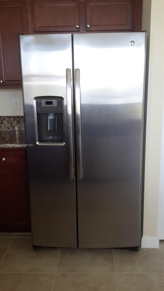 8630 West 33rd Avenue Hialeah, FL 33018 - Photo 5 of 22 a close view of water heater room