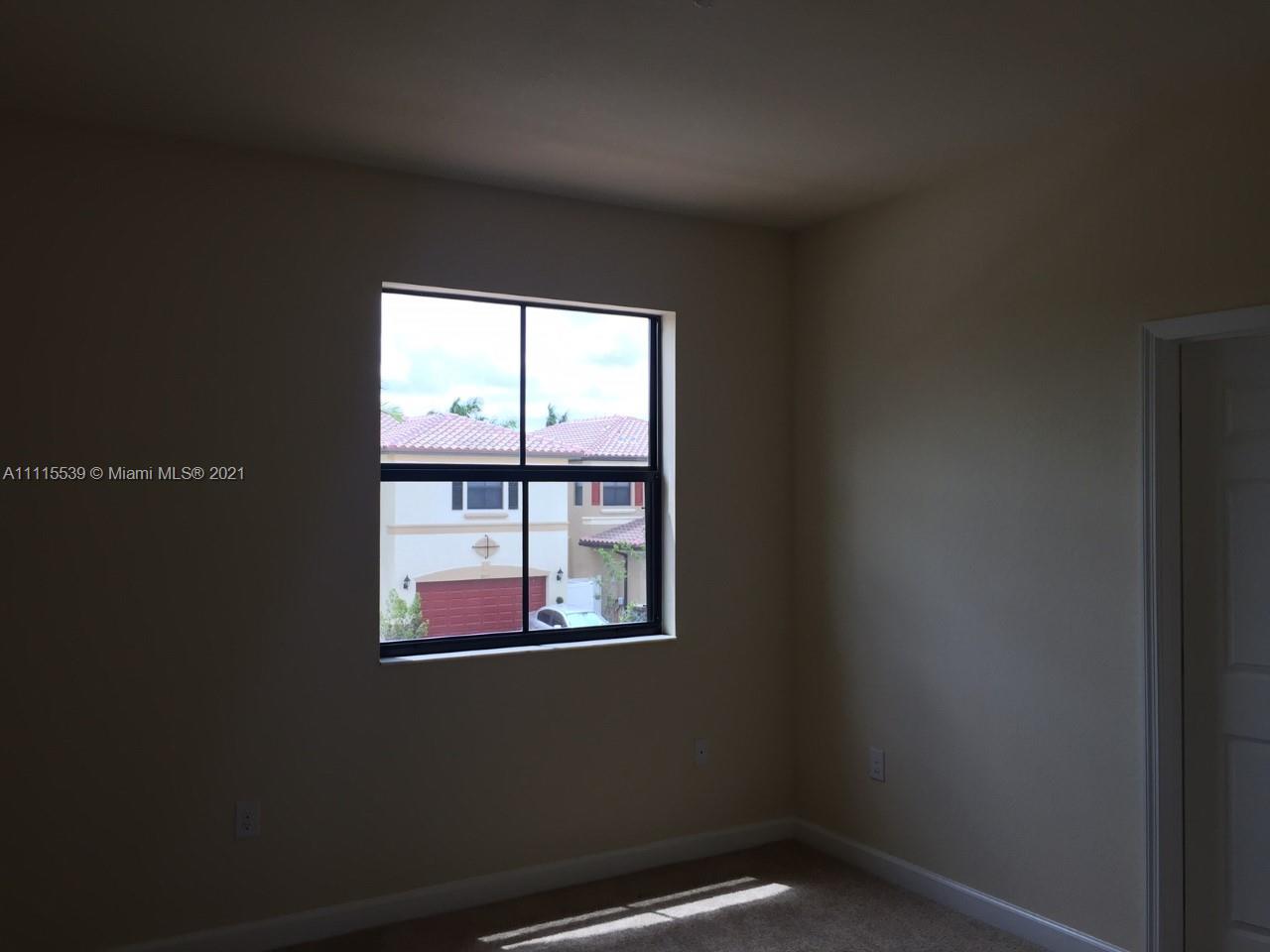 8630 West 33rd Avenue Hialeah, FL 33018 - Photo 6 of 22 a small space with a window