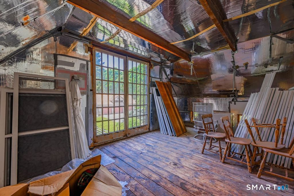 40 Ruffin Road Woodbury, CT 06798 - Photo 40 of 40 This potential studio space overlooks the pool and grounds - super light for painting!