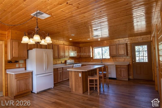 1129 Ponderosa Road, Unit 40 Hatch, UT 84735 - Photo 10 of 47 Wood-finish flooring with full wood-paneled walls and ceiling