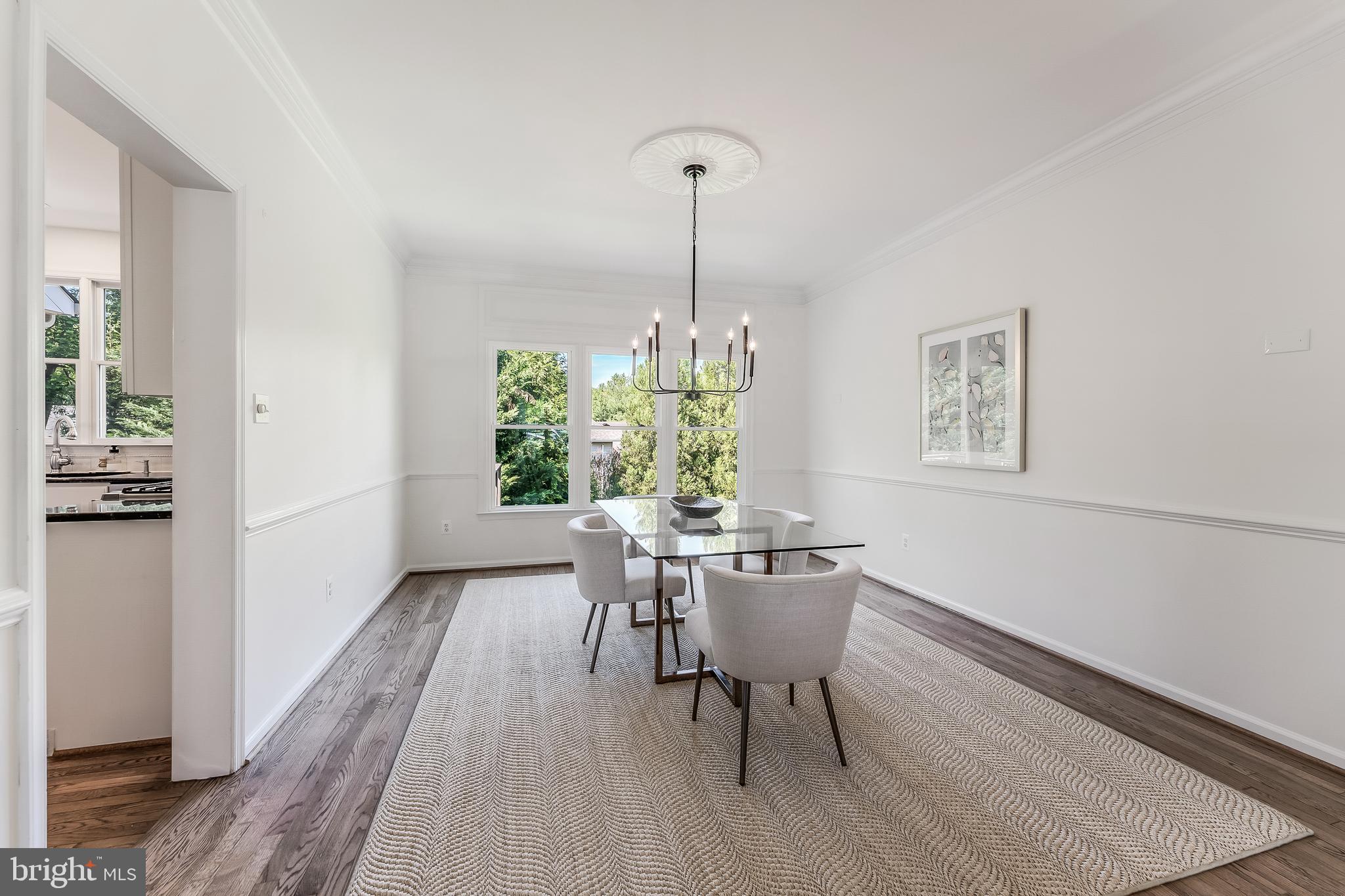 12537 Ridgegate Drive Herndon, VA 20170 - Photo 20 of 80 a view of a dining room with furniture window and wooden floor