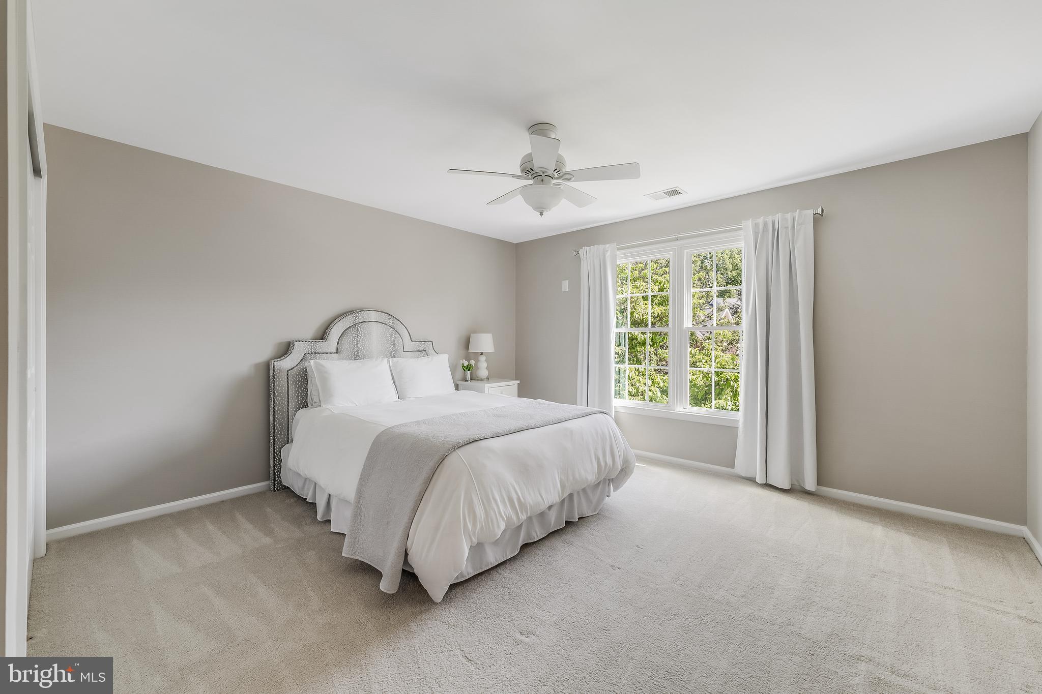 12537 Ridgegate Drive Herndon, VA 20170 - Photo 48 of 80 a bed room with a bed and a window