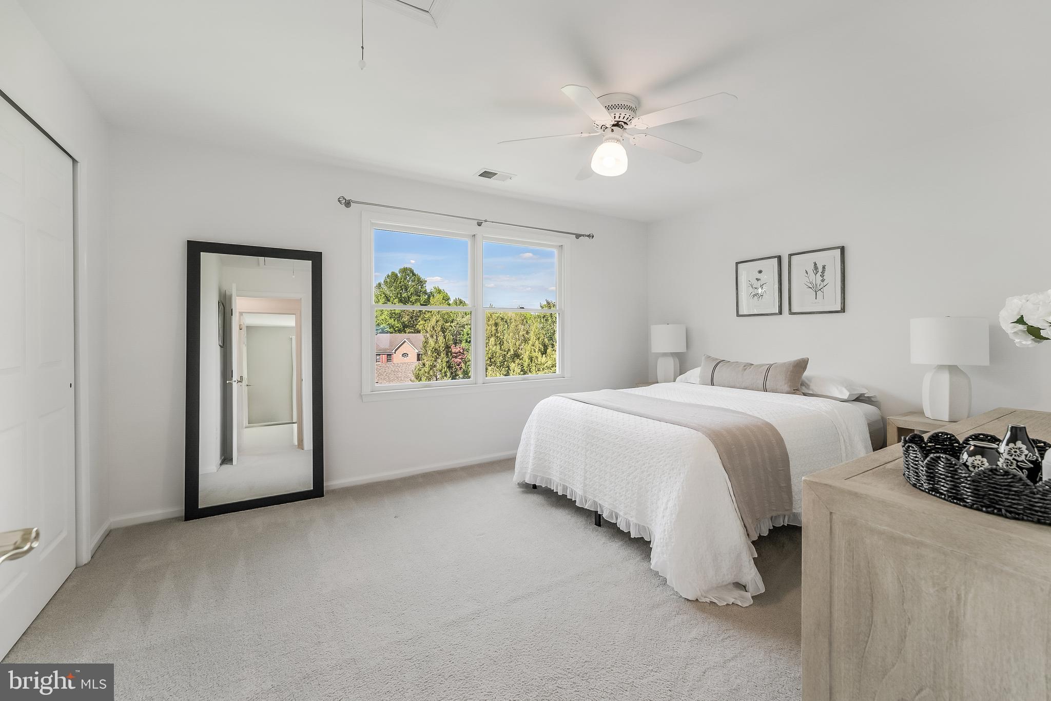 12537 Ridgegate Drive Herndon, VA 20170 - Photo 49 of 80 a spacious bedroom with a bed and a window
