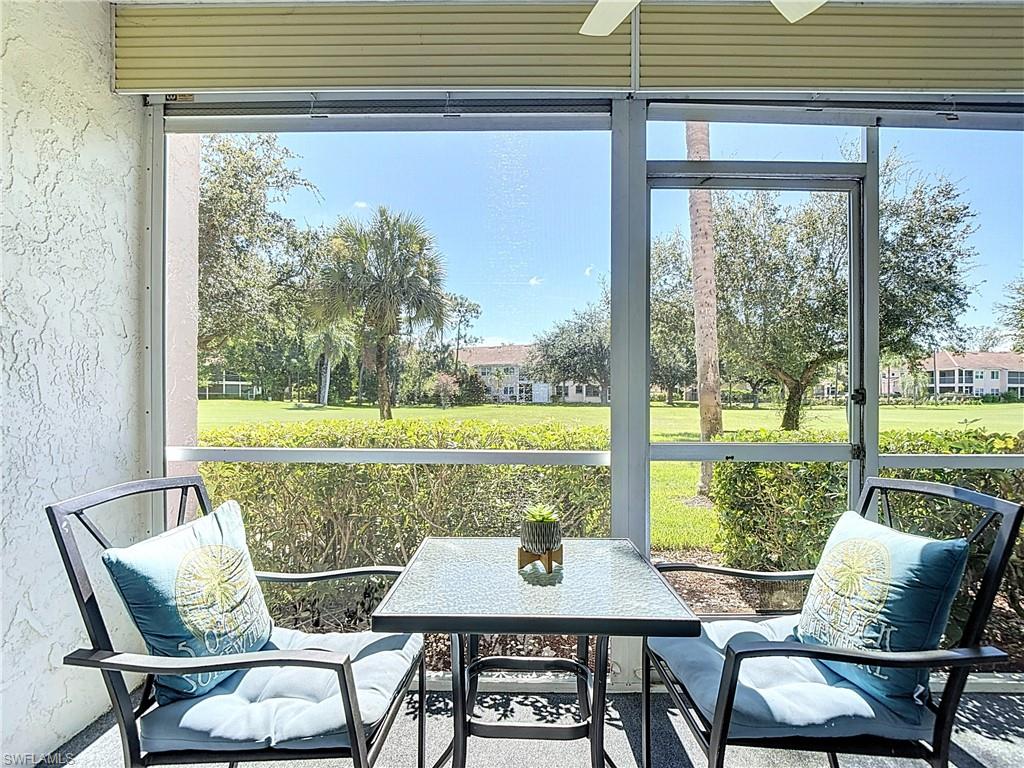 200 Turtle Lake Court, Unit 109 Naples, FL 34105 - Photo 31 of 37 Sunroom / solarium featuring plenty of natural light and ceiling fan