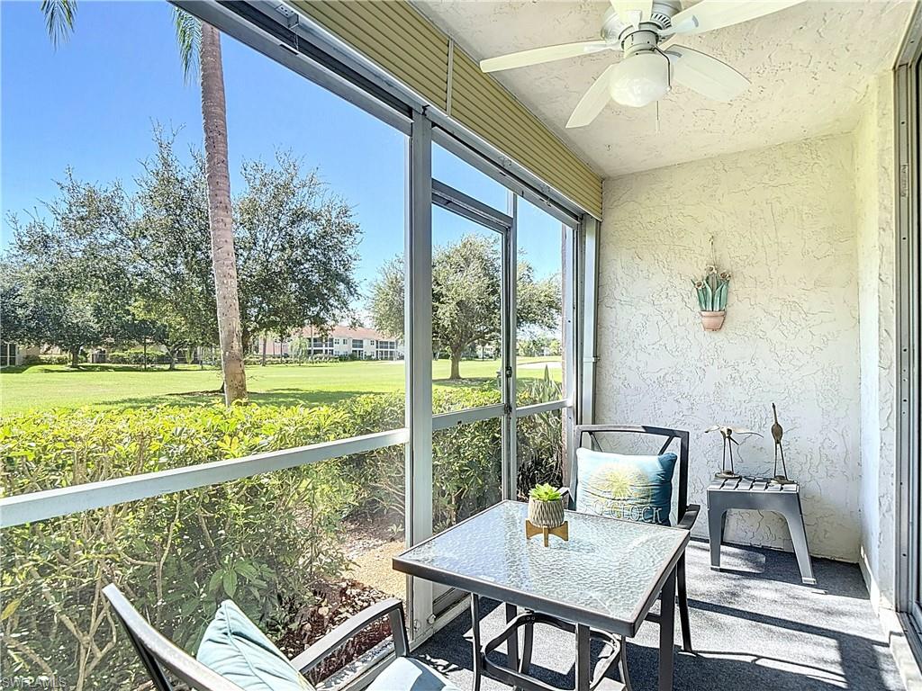 200 Turtle Lake Court, Unit 109 Naples, FL 34105 - Photo 32 of 37 Sunroom / solarium with a ceiling fan