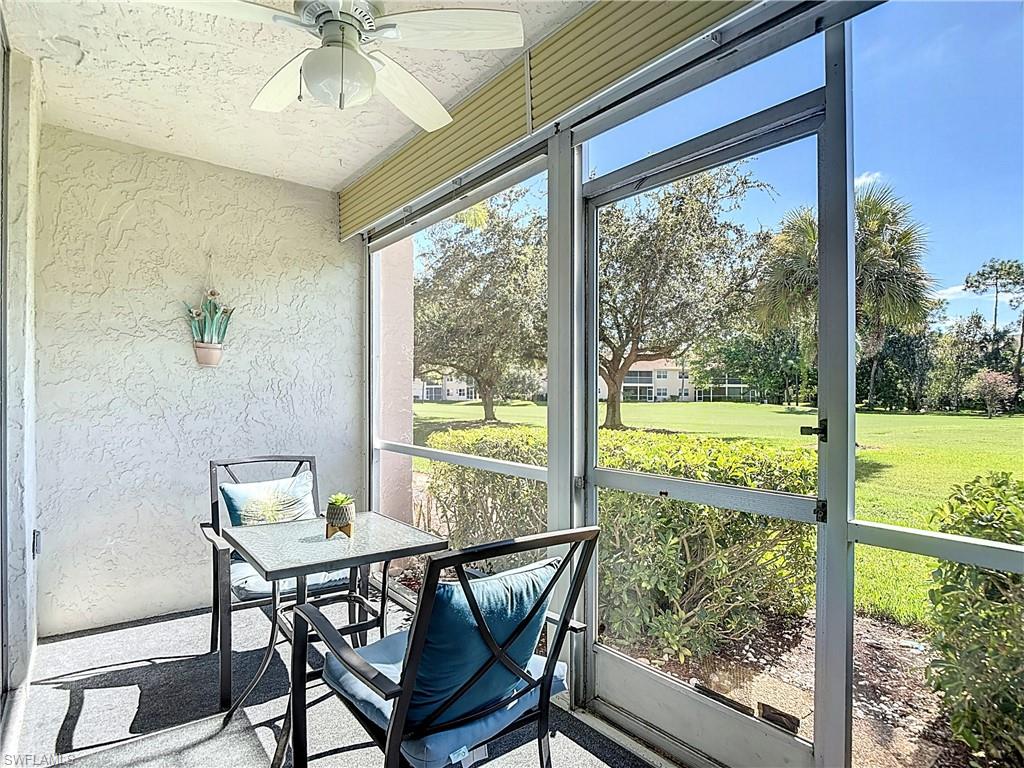 200 Turtle Lake Court, Unit 109 Naples, FL 34105 - Photo 34 of 37 Sunroom featuring ceiling fan