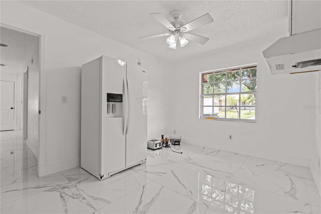 3104 Apricot Street Seffner, FL 33584 - Photo 15 of 31 a view of an empty room with a window