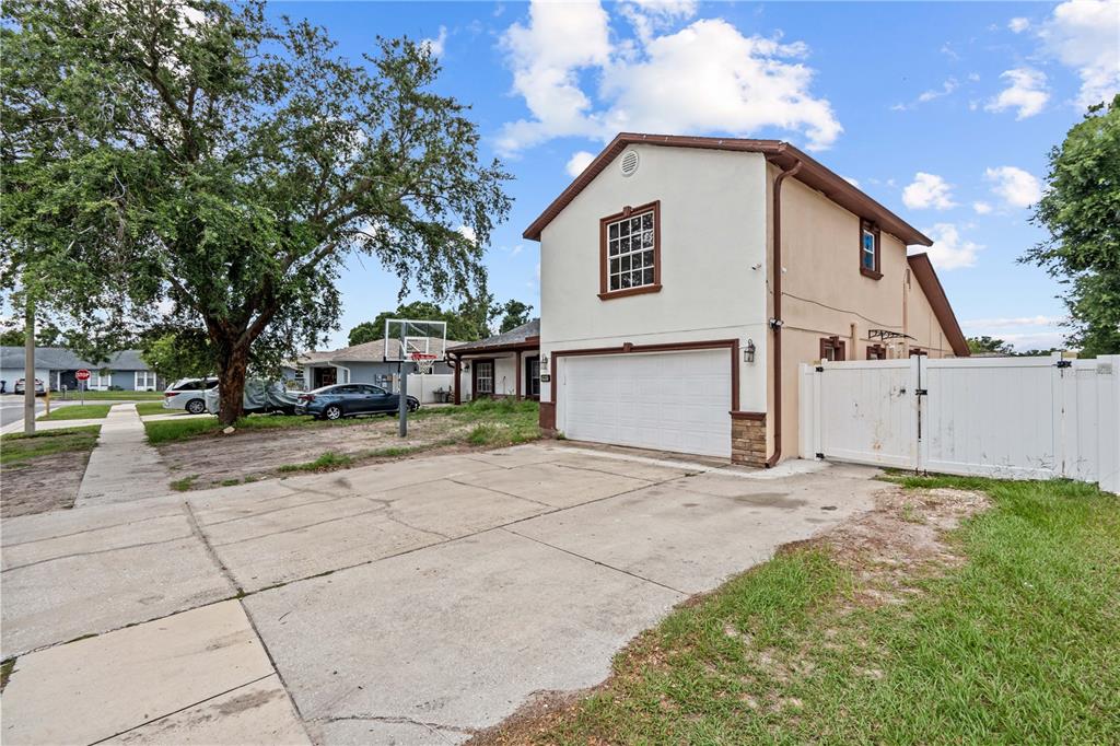 3104 Apricot Street Seffner, FL 33584 - Photo 2 of 31 a view of a house with a yard