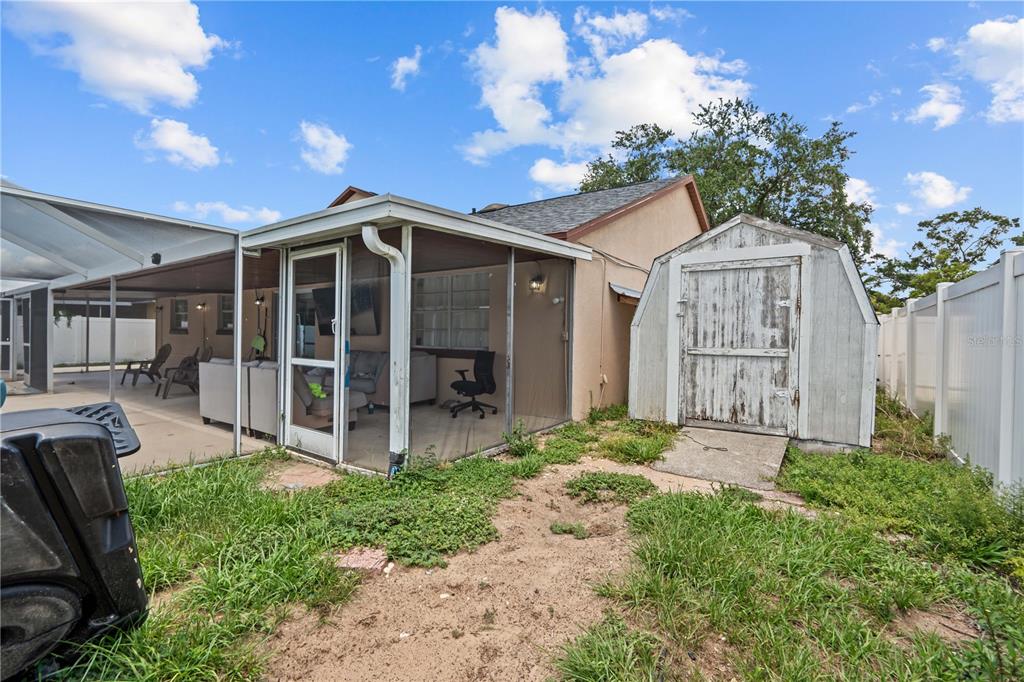 3104 Apricot Street Seffner, FL 33584 - Photo 26 of 31 a view of a house with a yard