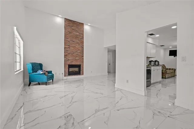 a living room with a fireplace