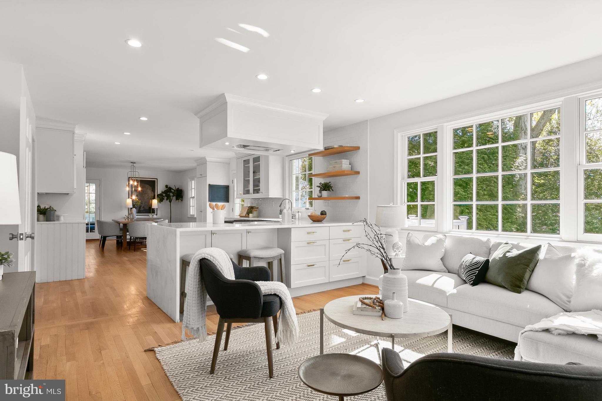 5120 Upton Street Northwest Washington, DC 20016 - Photo 14 of 53 a living room with furniture and a large window