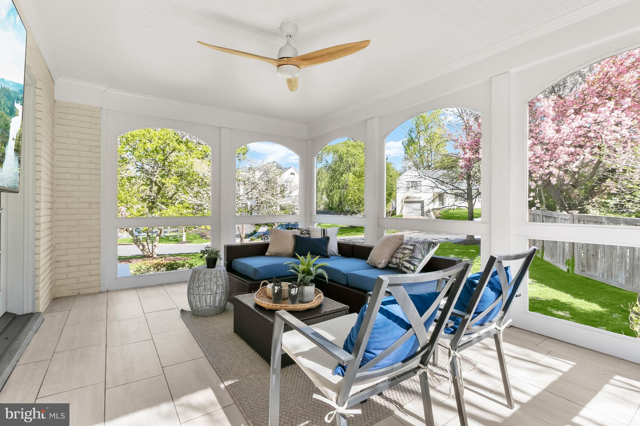 5120 Upton Street Northwest Washington, DC 20016 - Photo 21 of 53 a living room with fireplace furniture and a large window
