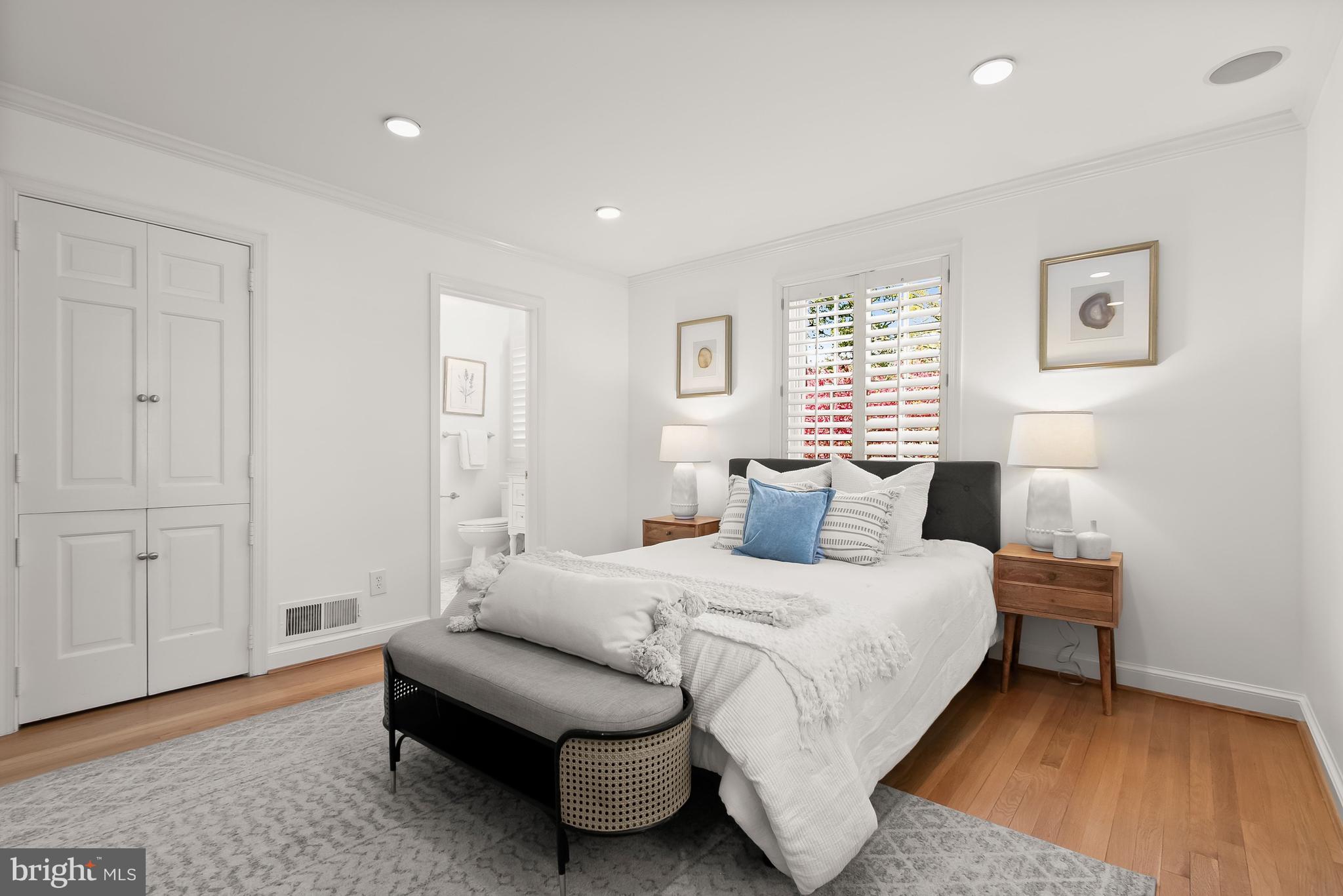 5120 Upton Street Northwest Washington, DC 20016 - Photo 22 of 53 a bedroom with a bed and a couch