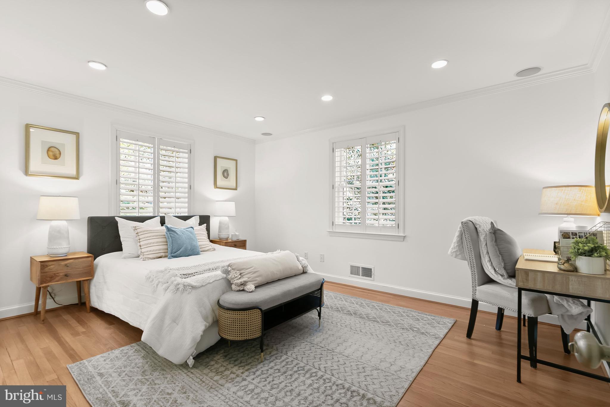 5120 Upton Street Northwest Washington, DC 20016 - Photo 23 of 53 a bedroom with a bed and a table