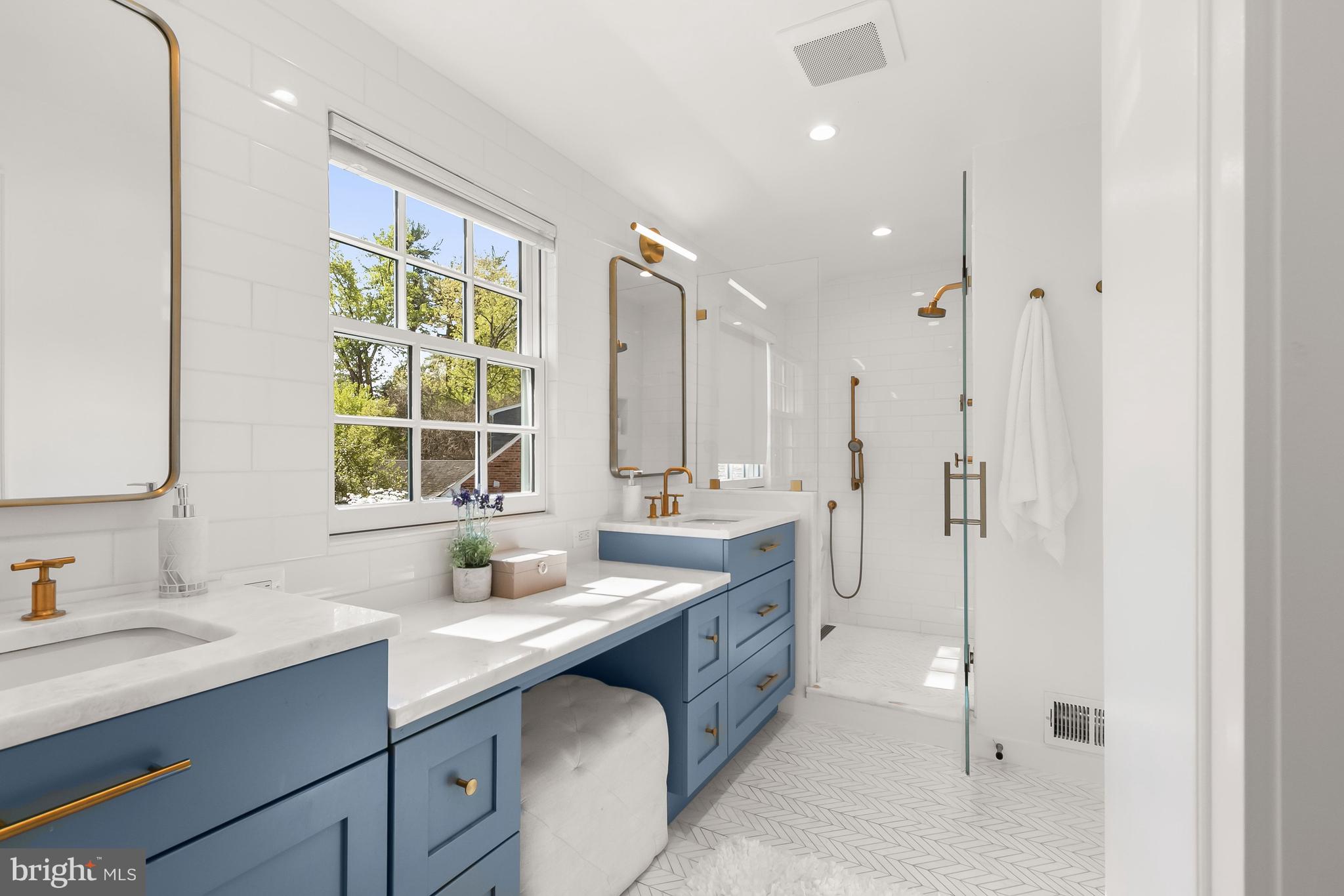 5120 Upton Street Northwest Washington, DC 20016 - Photo 28 of 53 a bathroom with a double vanity sink mirror and double