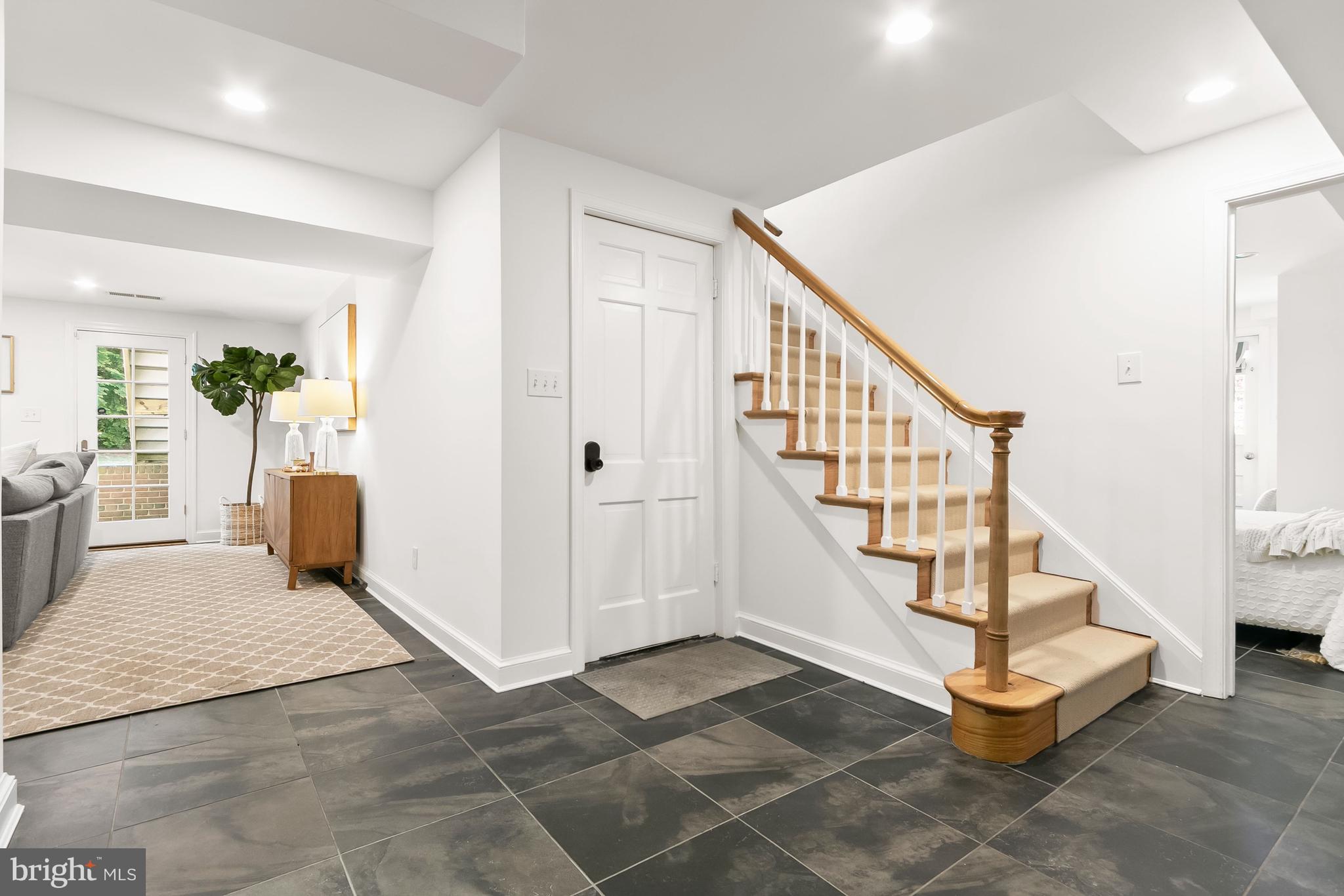 5120 Upton Street Northwest Washington, DC 20016 - Photo 35 of 53 a view of entryway and hall with wooden floor