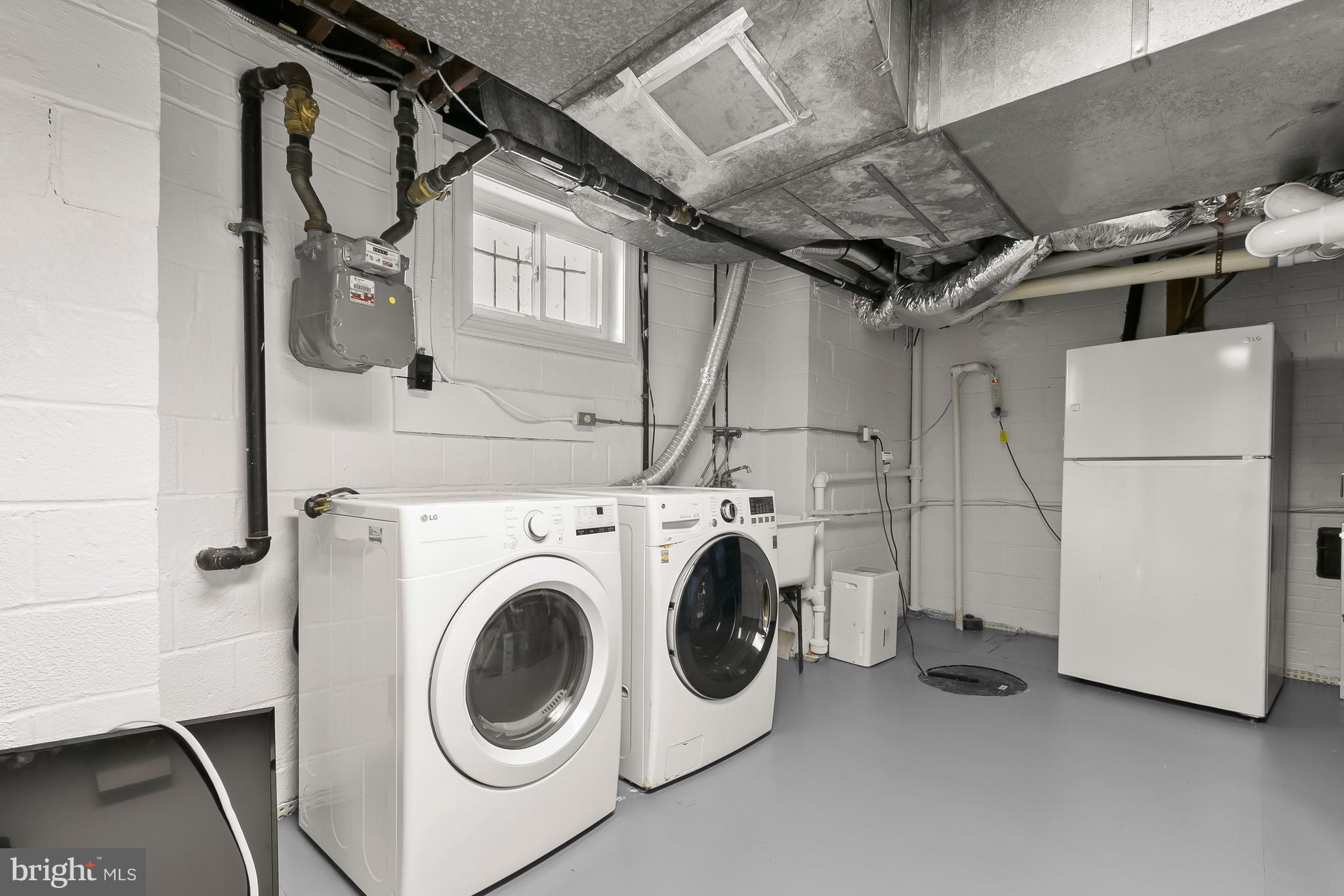 5120 Upton Street Northwest Washington, DC 20016 - Photo 42 of 53 a utility room with dryer and washer