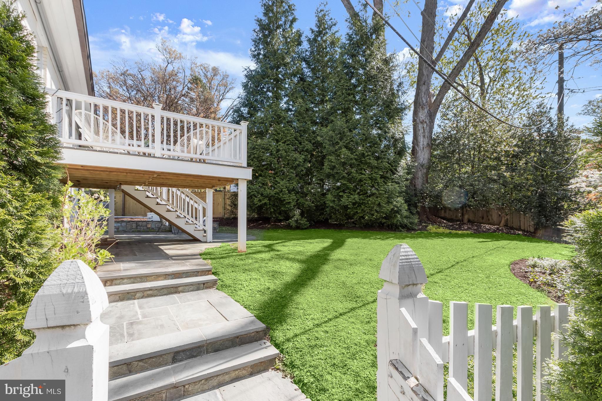5120 Upton Street Northwest Washington, DC 20016 - Photo 48 of 53 a view of a house with backyard and porch
