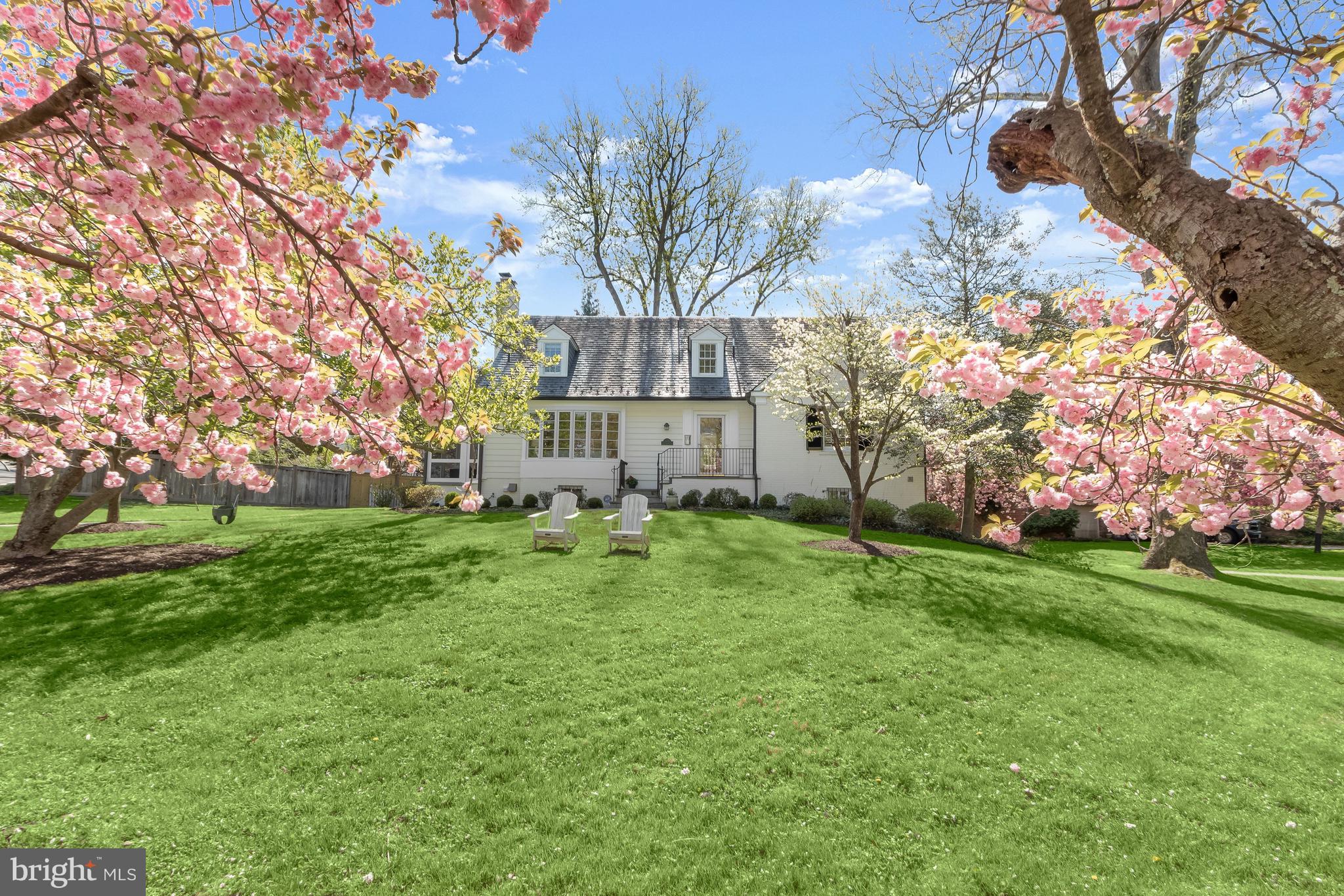 5120 Upton Street Northwest Washington, DC 20016 - Photo 51 of 53 a view of a house with a yard