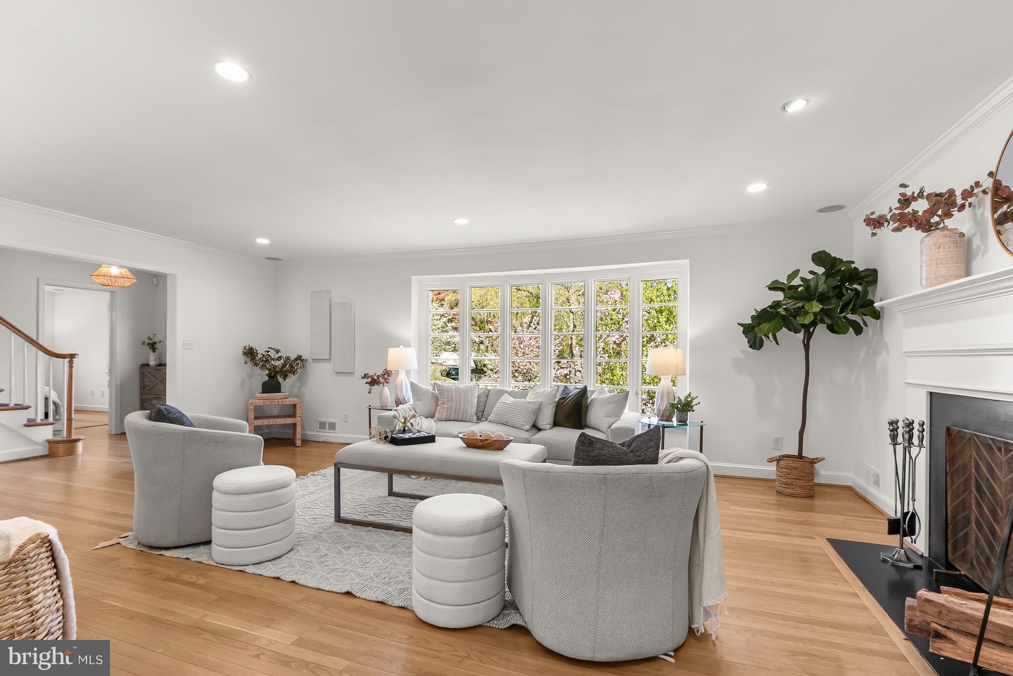 5120 Upton Street Northwest Washington, DC 20016 - Photo 8 of 53 a living room with fireplace furniture and a large window