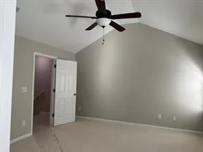 a kitchen with stainless steel appliances granite countertop a refrigerator stove top oven and granite counter tops