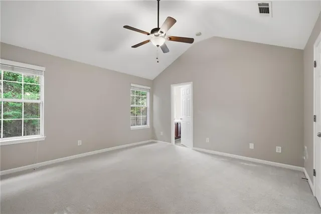 a view of a chandelier fan in a room