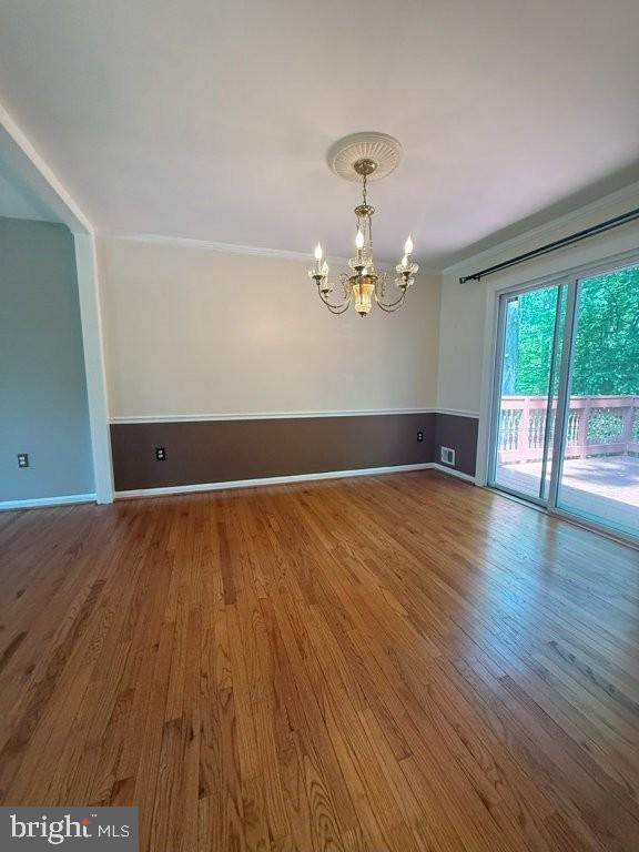 7801 Cliffside Court Springfield, VA 22153 - Photo 19 of 71 a view of empty room with wooden floor and fan