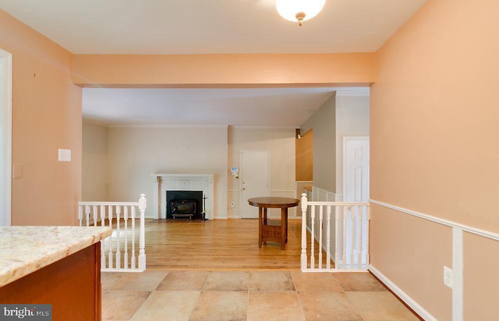 7801 Cliffside Court Springfield, VA 22153 - Photo 25 of 71 a view of a livingroom with furniture and fireplace