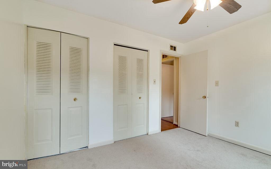 7801 Cliffside Court Springfield, VA 22153 - Photo 41 of 71 a view of empty room with chandelier fan