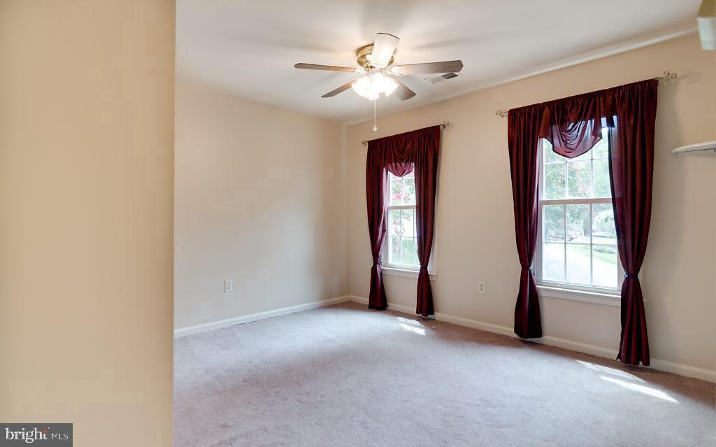 7801 Cliffside Court Springfield, VA 22153 - Photo 42 of 71 a view of an empty room with a window