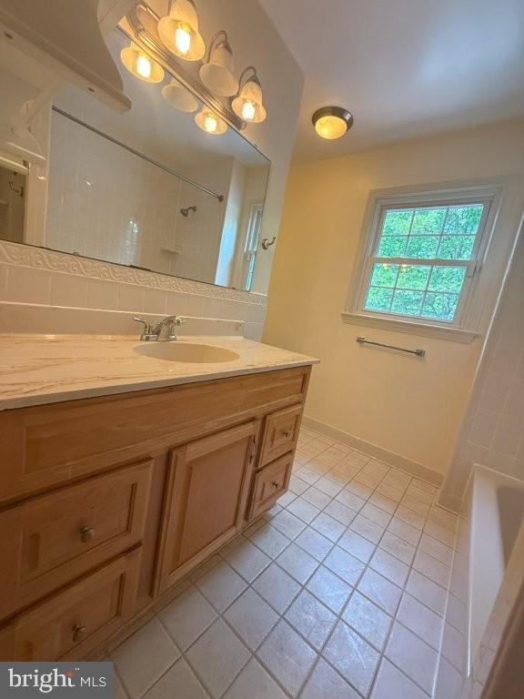 7801 Cliffside Court Springfield, VA 22153 - Photo 47 of 71 a bathroom with a sink and a mirror