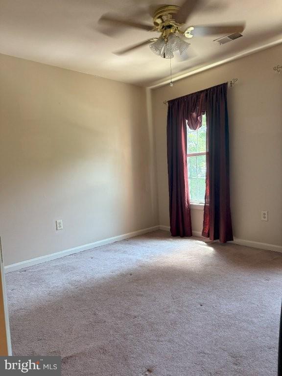 7801 Cliffside Court Springfield, VA 22153 - Photo 57 of 71 an empty room with windows and fan