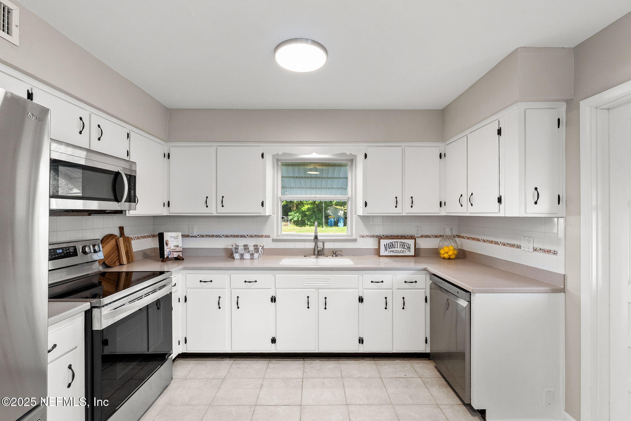 3225 Sandhurst Road East Jacksonville, FL 32277 - Photo 6 of 24 kitchen view 1