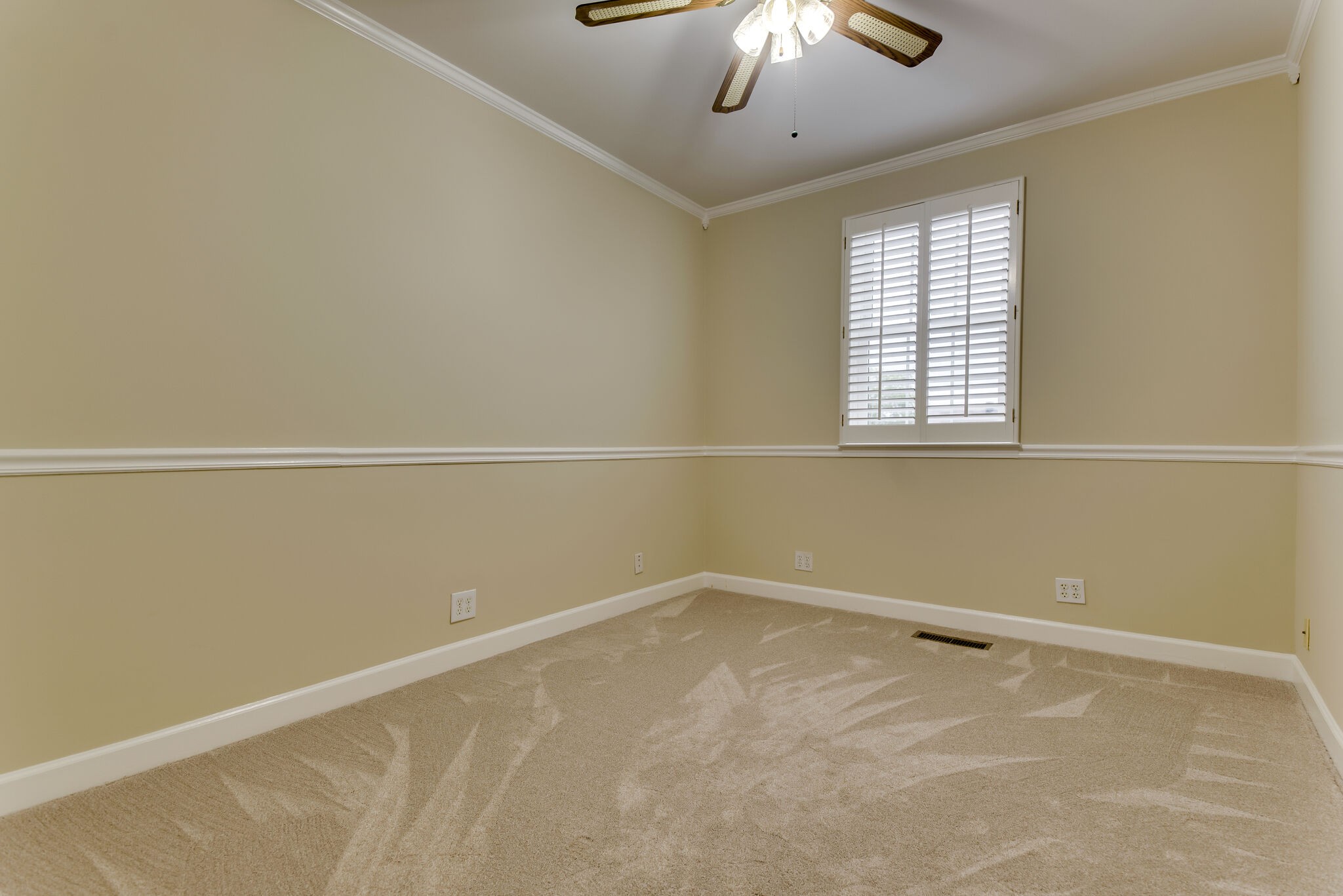 737 General George Patton Road Nashville, TN 37221 - Photo 29 of 36 an empty room with a chandelier fan and windows