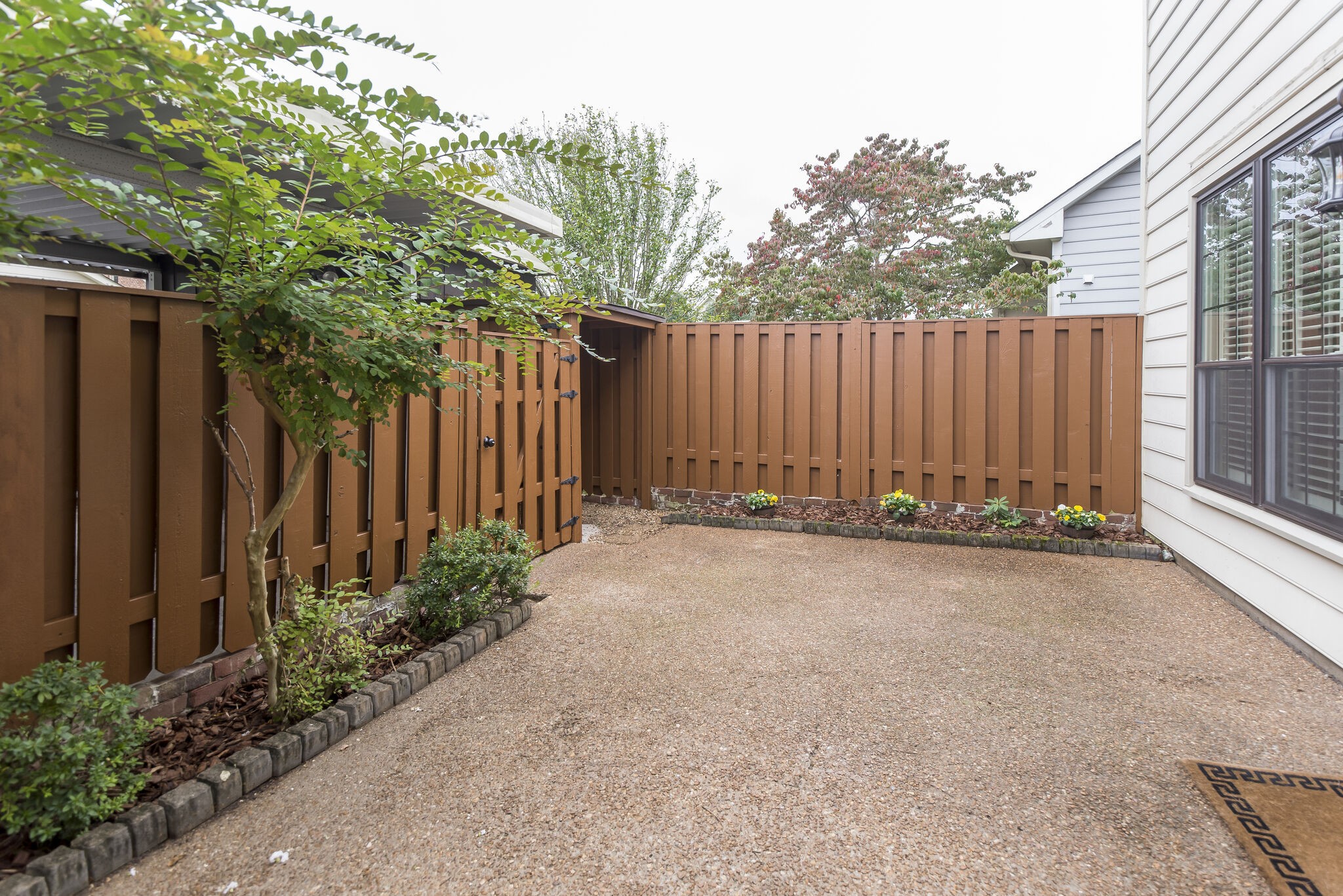 737 General George Patton Road Nashville, TN 37221 - Photo 33 of 36 a view of a house with a backyard and plants