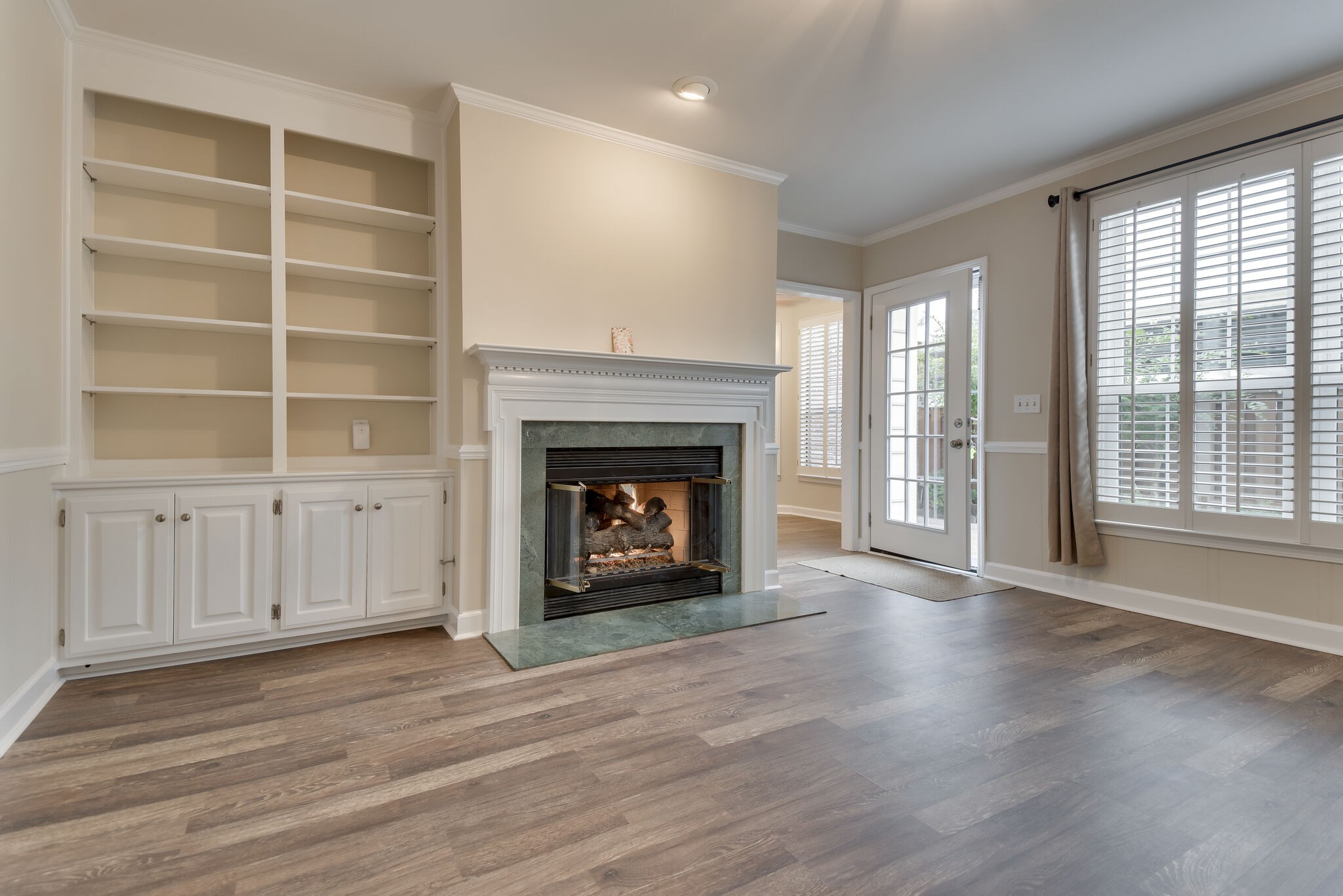 737 General George Patton Road Nashville, TN 37221 - Photo 6 of 36 a view of an empty room with a fireplace and a window