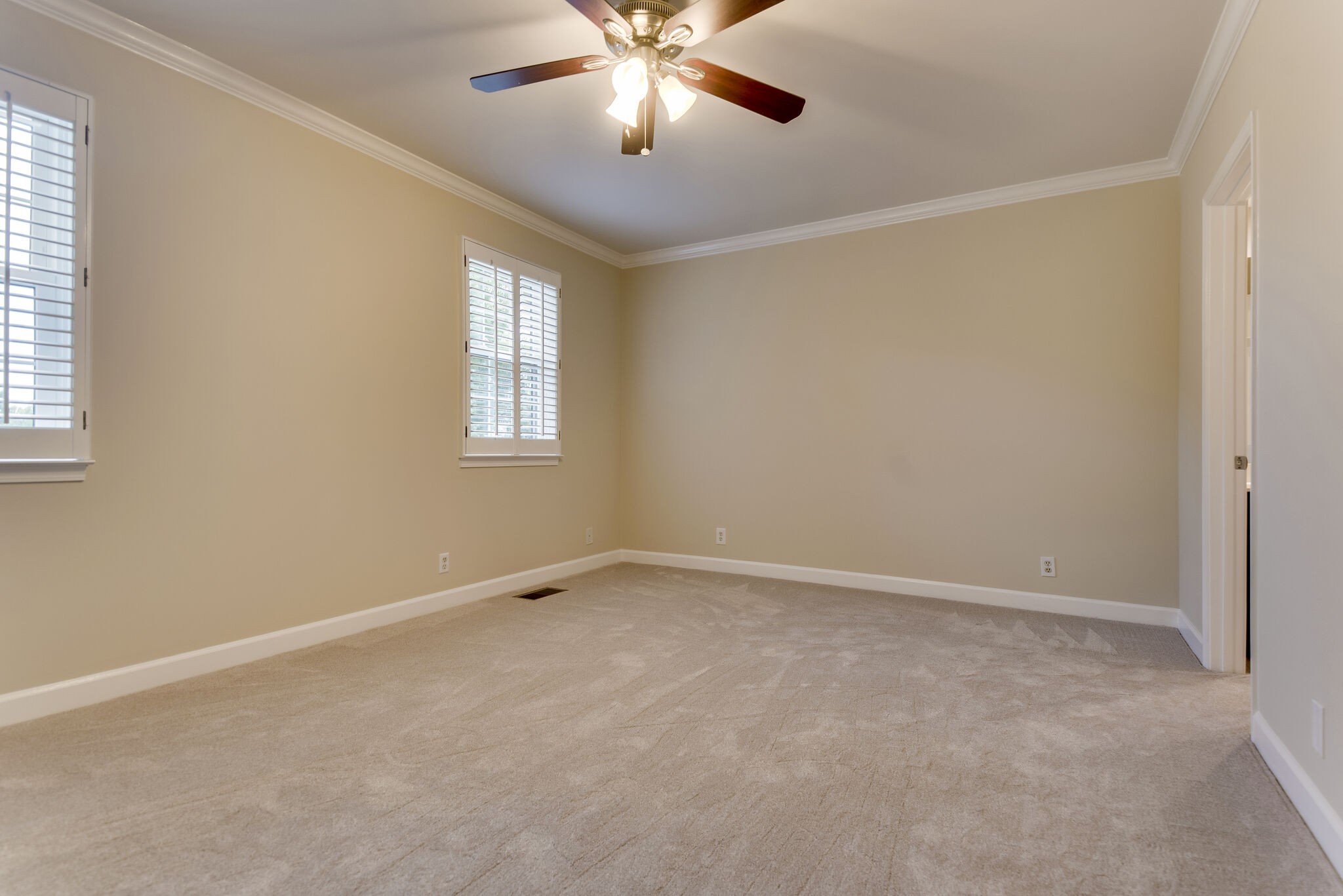 737 General George Patton Road Nashville, TN 37221 - Photo 9 of 36 an empty room with windows and fan