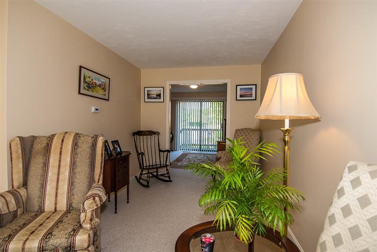 481 Buck Island Road, Unit 15D West Yarmouth, MA 02673 - Photo 12 of 21 a living room with furniture and a potted plant