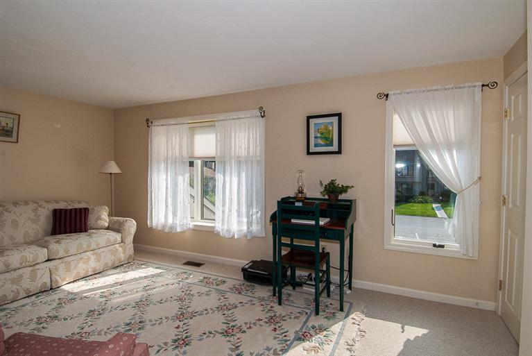 481 Buck Island Road, Unit 15D West Yarmouth, MA 02673 - Photo 15 of 21 a living room with furniture and a window