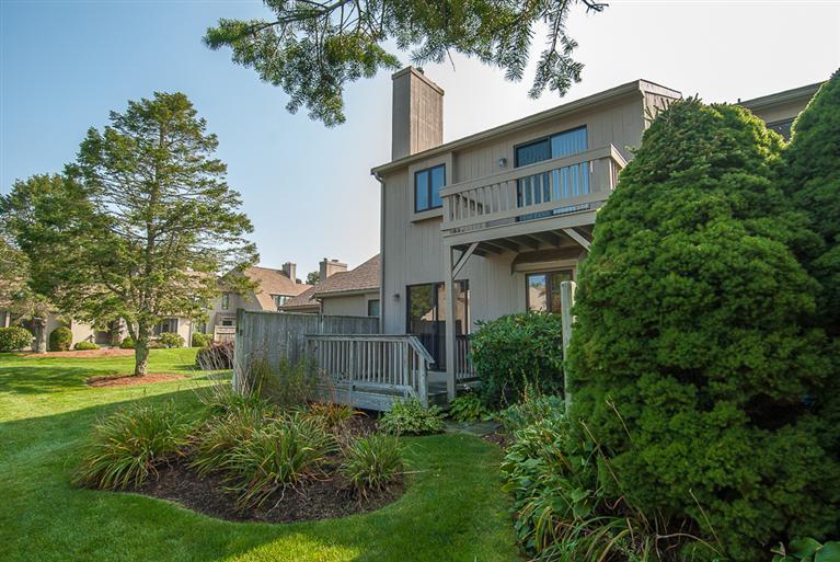 481 Buck Island Road, Unit 15D West Yarmouth, MA 02673 - Photo 3 of 21 a view of a house with a garden and plants