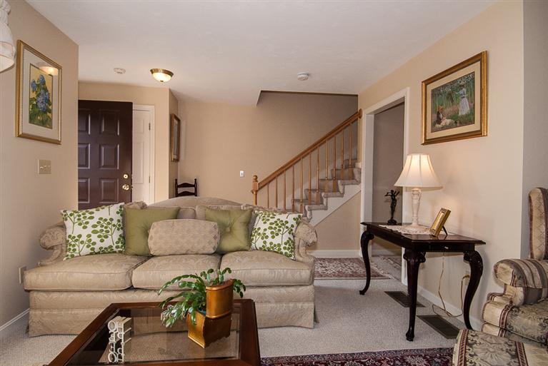 481 Buck Island Road, Unit 15D West Yarmouth, MA 02673 - Photo 8 of 21 a living room with furniture and wooden floor