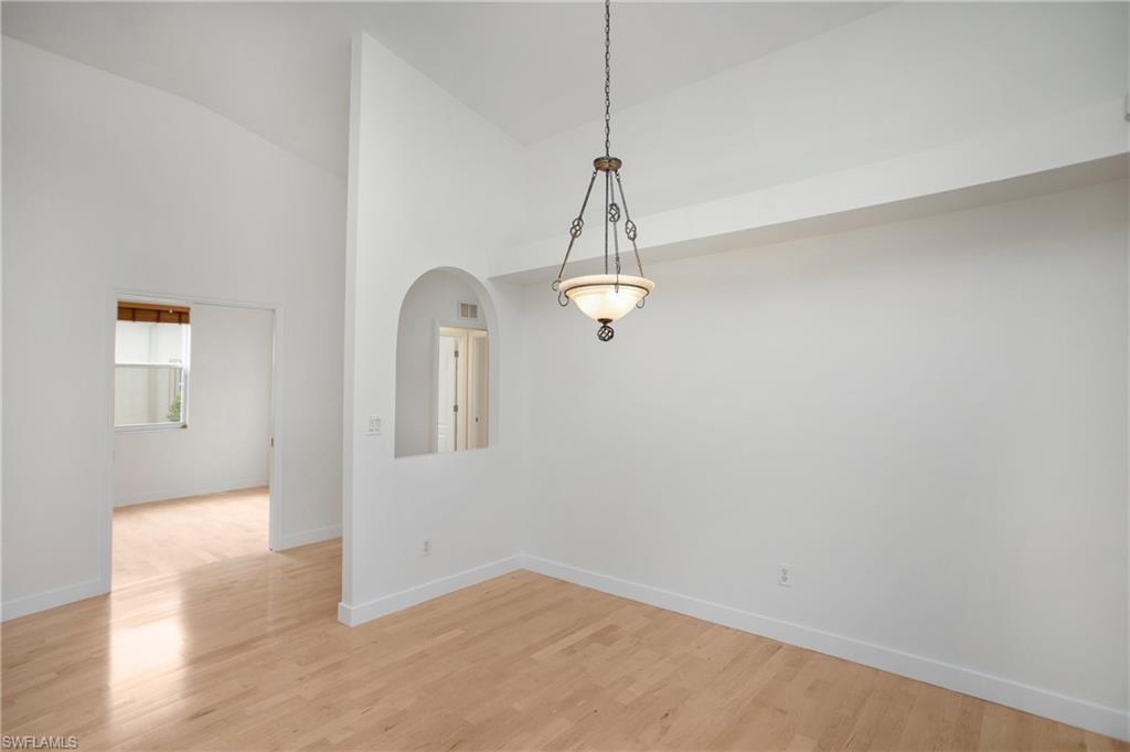 20951 Rivers Ford Estero, FL 33928 - Photo 12 of 49 a view of a room with a hanging light and kitchen