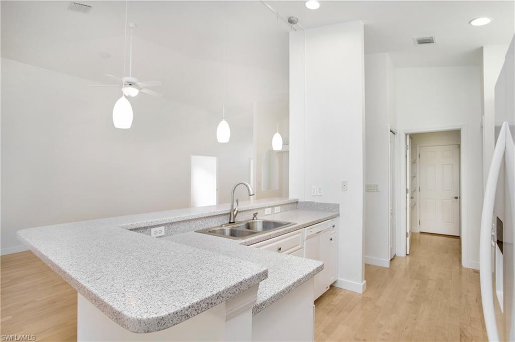 20951 Rivers Ford Estero, FL 33928 - Photo 16 of 49 a bathroom with a sink vanity granite and a mirror
