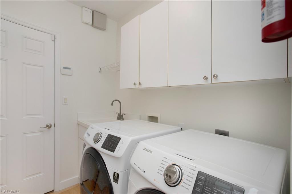 20951 Rivers Ford Estero, FL 33928 - Photo 19 of 49 a utility room with dryer and washer