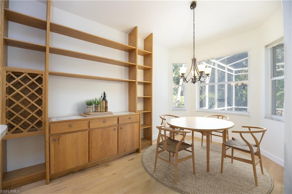 20951 Rivers Ford Estero, FL 33928 - Photo 21 of 49 a view of a dining room with furniture and window