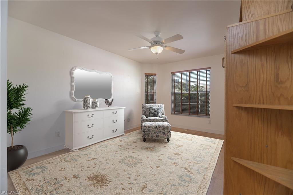 20951 Rivers Ford Estero, FL 33928 - Photo 25 of 49 a living room with furniture and a large window