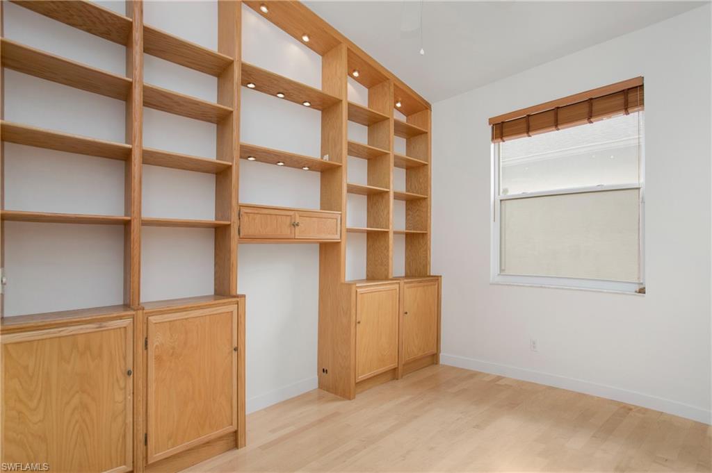 20951 Rivers Ford Estero, FL 33928 - Photo 27 of 49 a view of walk in closet with empty racks