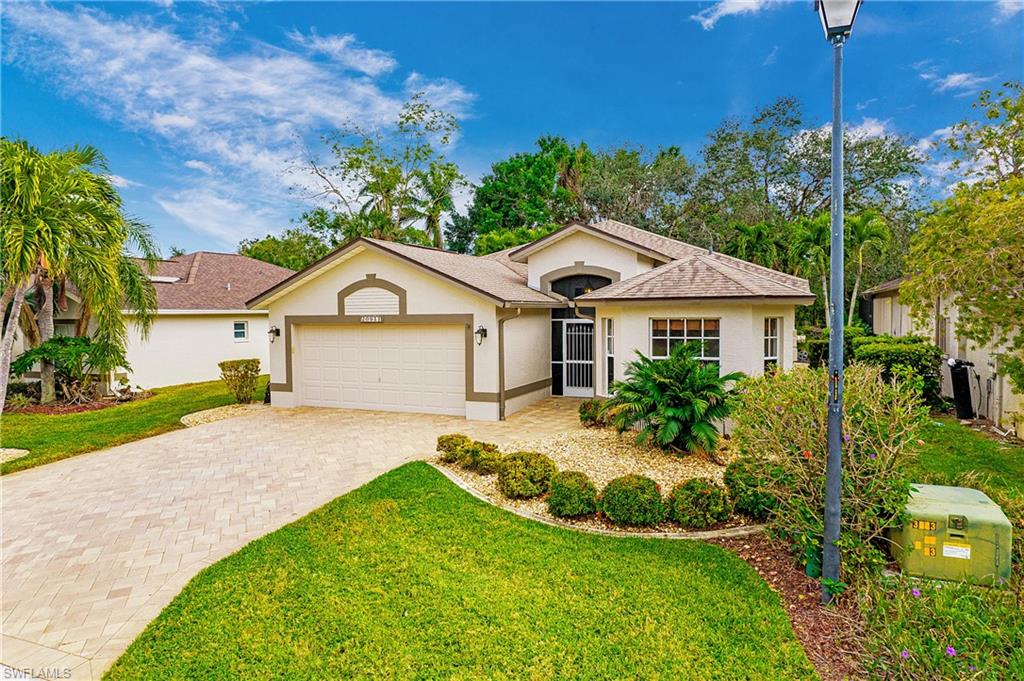 20951 Rivers Ford Estero, FL 33928 - Photo 3 of 49 a view of a house with a yard and potted plants